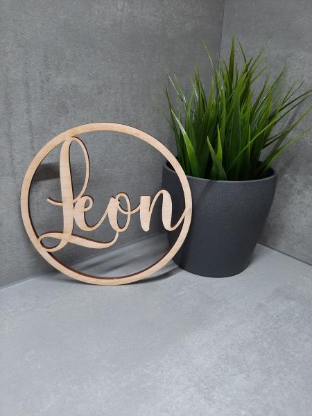 Schrift im Kreis "Name"